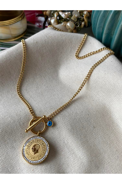 deluxe takı ve giyim Altın görünümlü nazar boncuğu detaylı çelik ata kolye