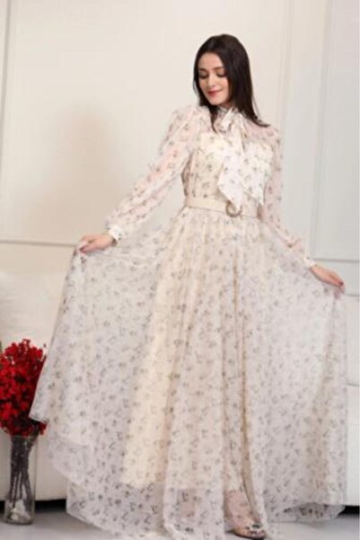 mleha Soft tulle dress with a tie neck and subtle shimmer