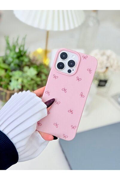 Go Aksesuar غطاء سيليكون مرن متوافق مع آيفون 16 برو ماكس بتصميم فيونكة وردية