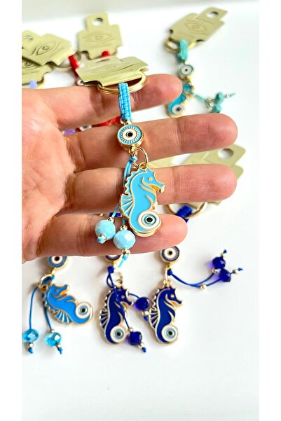 Cassime Breloc cu ochi de dragon albastru deschis, placat cu aur