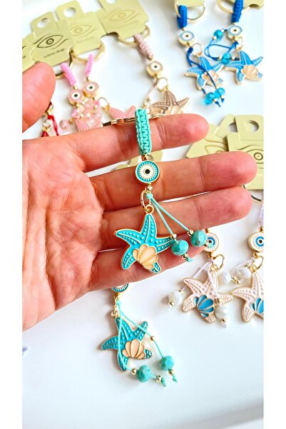 Cassime Breloc cu ochi de turcoaz, stea de mare, placat cu aur