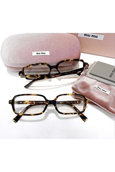 Sunglasses Women's eyeglasses, tiger print frame and clear lenses. Includes a pink velvet case and cleaning cloth.