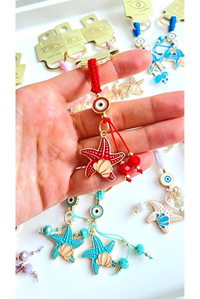 Cassime Breloc cu ochi de stea de mare roșie, placat cu aur