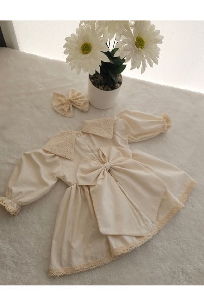 Elwirababyboutiqe فستان كريمي بياقة مدببة