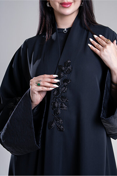 Al Afnan Boutique عبايه مميزه جذابه من قماش الكريب بلمسه خلابه من القماش اللا...