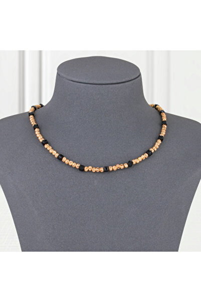 Un Gold and black alternative gold necklace