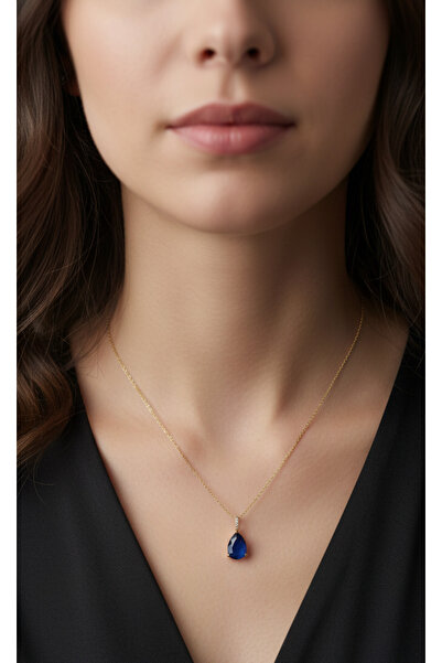 Artepieza co. قلادة من الفولاذ المقاوم للصدأ بلون ذهبي مع حجر متسلسل باللون ا...