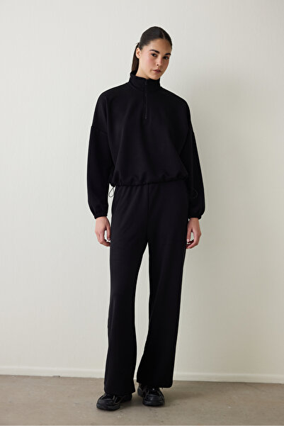 Penti Schwarzes, seidiges Crop-Sweatshirt mit Stehkragen