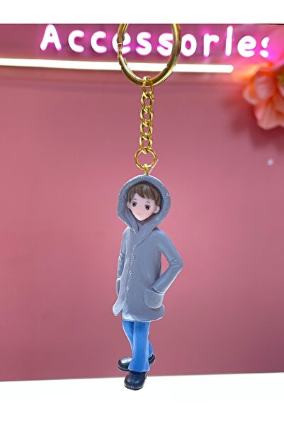 La She Accessories Keychain with a male figure