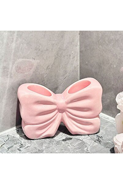 Choice رف تخزين فرشاة أسنان على شكل فيونكة وردية اللون على شكل فراشة، يُعلق على حوض الحمام، مناسب لفرشاة الأسنان الكهربائية ومعجون الأسنان.