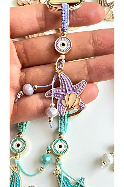 Cassime Breloc cu ochi de stea de mare liliac, placat cu aur