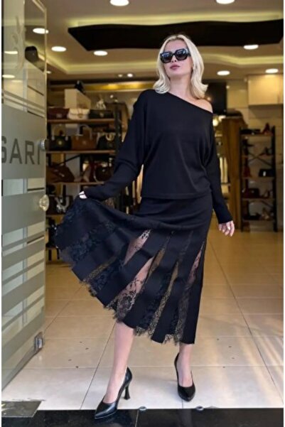 Unique طقم تريكو بلوزة وتنورة بتفاصيل دانتيل