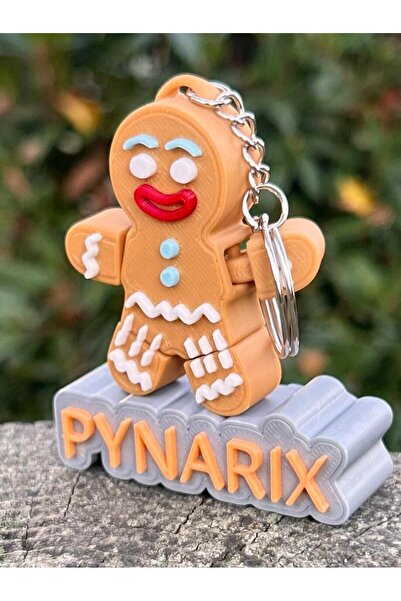 pynarix بسكويت الزنجبيل الشتوي - طاقة حلوة 🍪 سلسلة مفاتيح صغيرة ثلاثية الأبعاد قابلة للحركة (5.8 سم)
