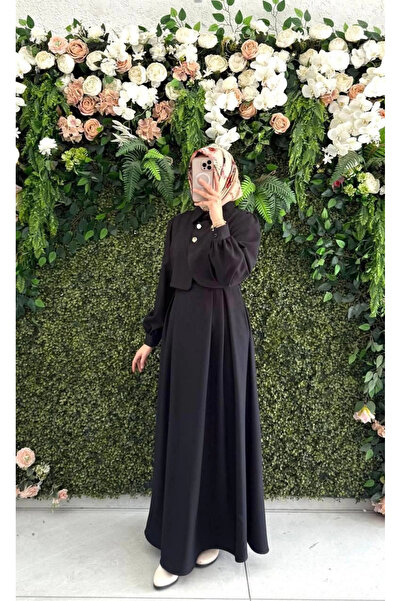 Butik siyah yuniceft kumaş elbisemiz