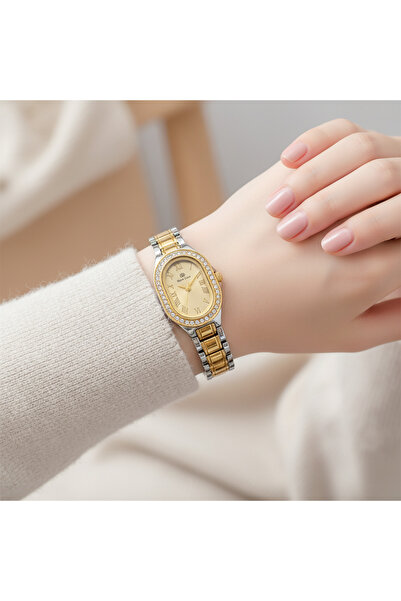 Roseline Elegant women's wristwatch with a bezel and sparkling stones – gold x silver