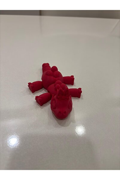 Mini boyutlu Ejderha tasarımı kırmızımsı pembe renginde hareketli oyuncak