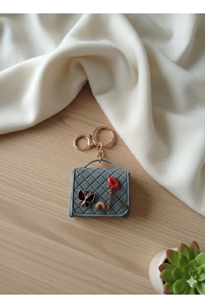 TChic حلية مفاتيح على شكل حقيبة صغيرة مزينة بالشفاه