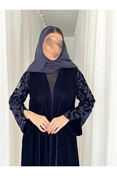 OLGA-ABAYA A stylish and modern winter abaya from Olga, made of navy velvet with embroidered velvet trim, featuring a quarter-circle silhouette and including a headscarf.