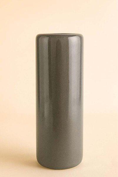 Oss elhetraf تحفة خزفية بتصميم أسطواني أنيق