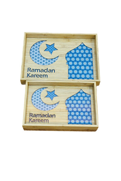 WOOD A set of two wooden serving trays with a glass base and decorative Ramadan-themed engravings.