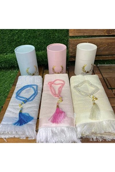Generic An elegant cylindrical box containing a prayer mat and prayer beads, featuring a practical design, high quality, and multiple colors.