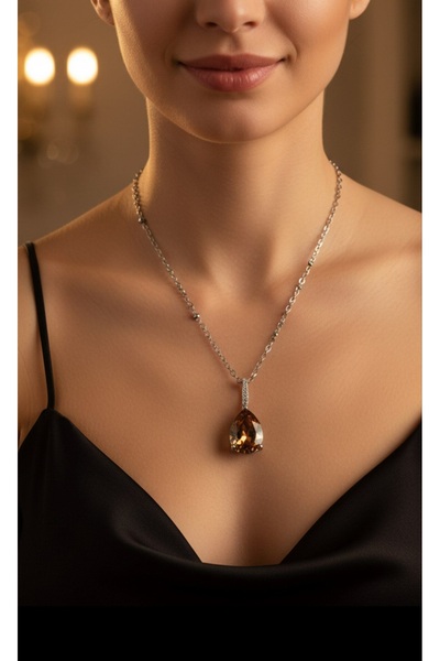 stainless steell قلادة فضية اللون مع حجر الكهرمان على شكل قطرة وسلسلة من الفولاذ