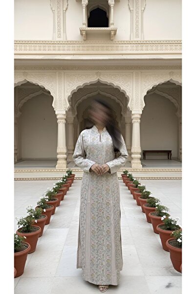 ISHRAQAT AL-AMAL Elegant, fully embroidered cotton jalabiya with long, embroidered sleeves, perfect for special occasions.