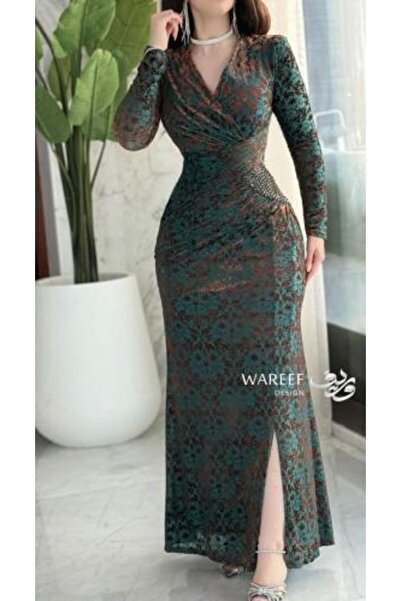 WAREEF FASHION A soft emerald green dress with botanical prints and elegant crystal accents.
