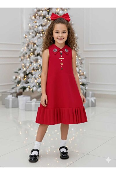 gmax A girl's dress decorated with colorful stones and embellishments, and with a ruffled hem.