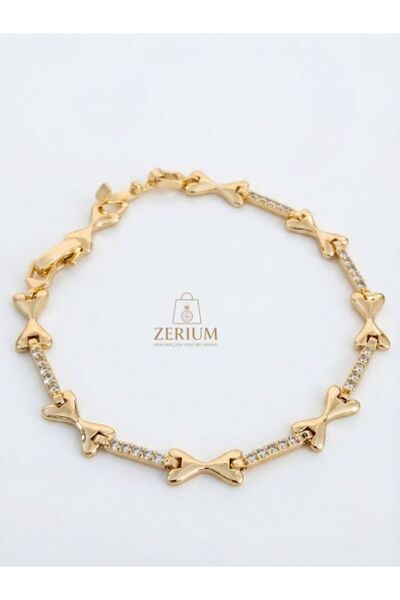 ZERİUM سوار من الفولاذ مرصع بحجر الزركون على شكل فيونكة، تصميم فاخر باللون ال...