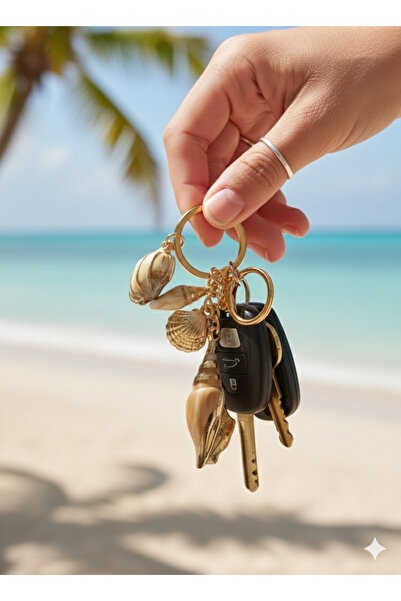 burjalmodah Elegant keychain decorated with seashells