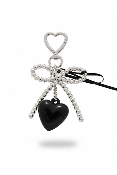 burjalmodah Bag charm with a beaded bow and black heart
