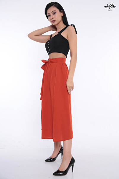 Stylish Elegant high-waisted skirt in dark orange, adorned with buttons and a stylish belt.