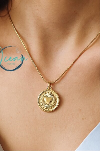 OCEANDESING Parlayan Güneş Tasarımlı Altın Renk Oval Paslanmaz Çelik Kadın Ko...