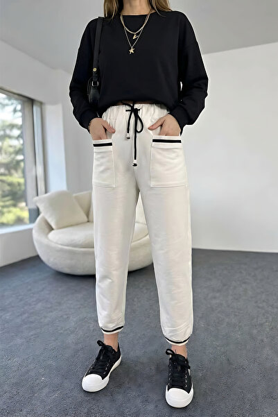 Qaju Чорні штани з трикотажними деталями на кишенях і штанинах