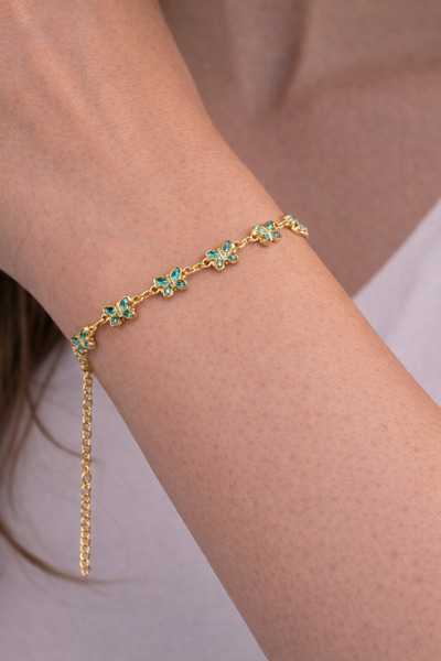 charmove ile kendinizi şımartın Women's gold-tone chain bracelet with blue st...