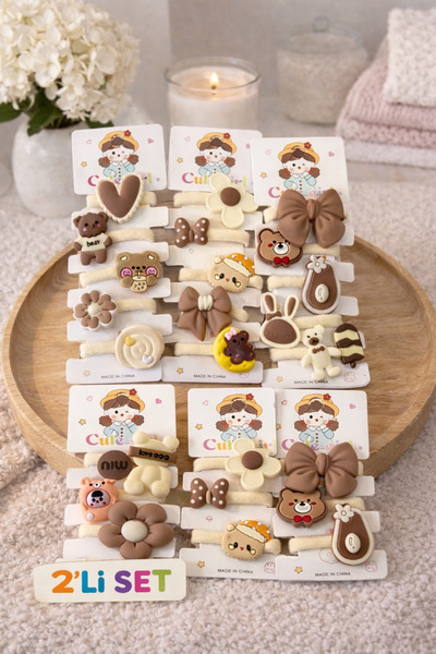 NOT GUILTY مشبك مطاطي لطيف على شكل فتاة - مجموعة من قطعتين للاستخدام اليومي