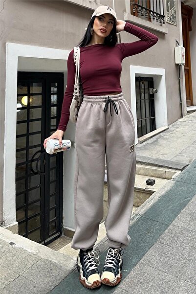 WeShaya Mink Fleece-Lined High Waist Lace-Up Elastic Leg Trousers with Pockets and Oversized Arma Detailing