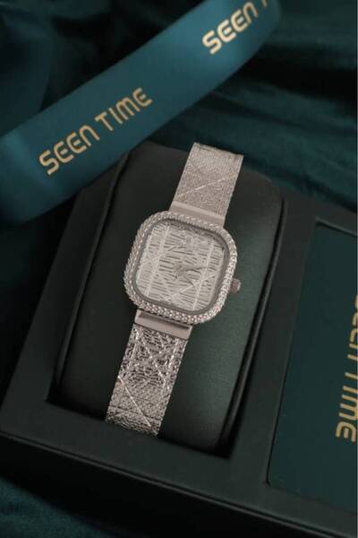 SEEN ساعة نسائية فضية اللون بمينا أبيض، موديل 2509