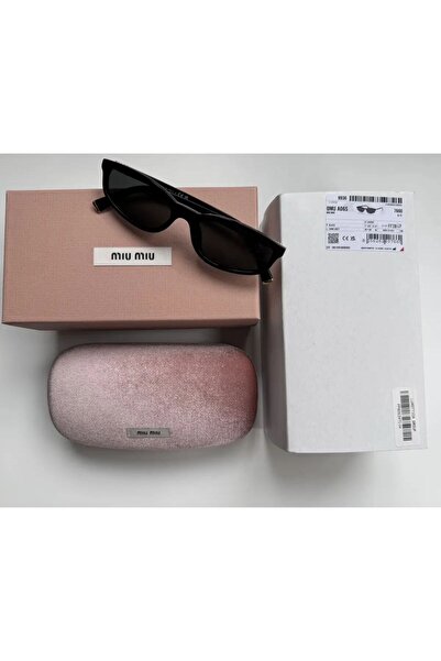 Generic Women's sunglasses, black frame and dark black lenses. Comes with a pink velvet case and protective box.