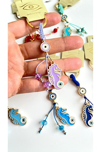 Cassime Μπρελόκ με επιχρυσωμένο μάτι του κακού ματιού σε λιλά χρώμα