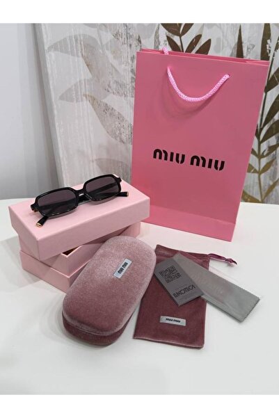 Sunglasses Women's sunglasses, black frame and black lenses. Comes with a velvet case, cloth pouch, card, and tissue.