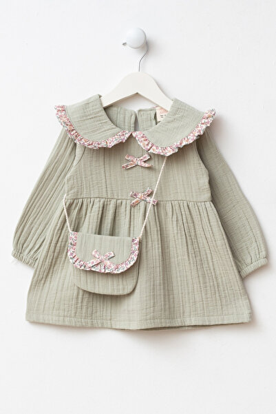 Minipodyum Fiyonk Detaylı Çantalı Bebe Yakalı Müslin Bayramlık Kız Bebek Elbise