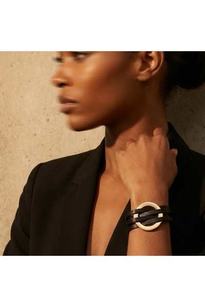 COCOSH TAKI Black leather multi-bracelet with gold detail in modern design