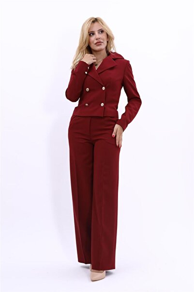 ÖNDER ÖZSOY سترة واسعة الياقة بأزرار على الجهتين مع جيوب كلاسيكية بنطلون واسع...