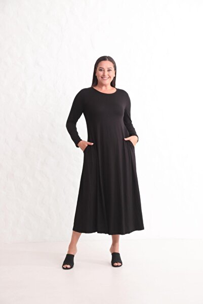 Çağlam moda Duz renk yenlari cepli boydan elbise