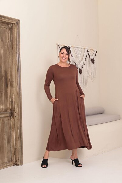 Çağlam moda Duz renk yenlari cepli boydan elbise