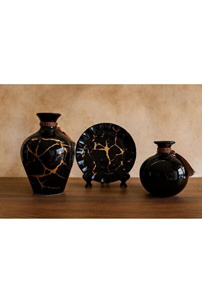 Oss elhetraf Black ceramic vase and saucer set with a Kintsugi pattern – Mode...