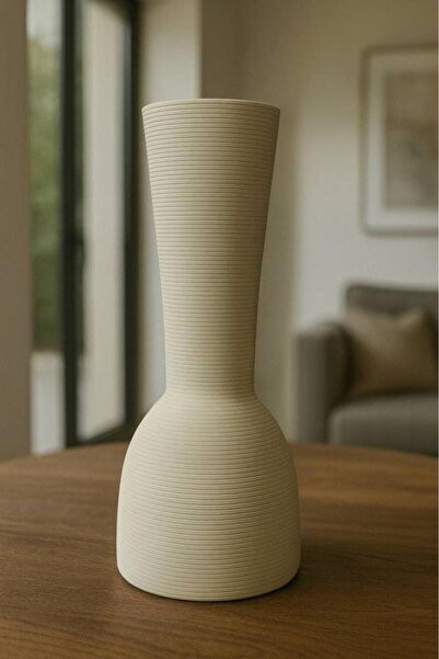 Oss elhetraf Modern ivory-colored vase with a simple cylindrical design for h...