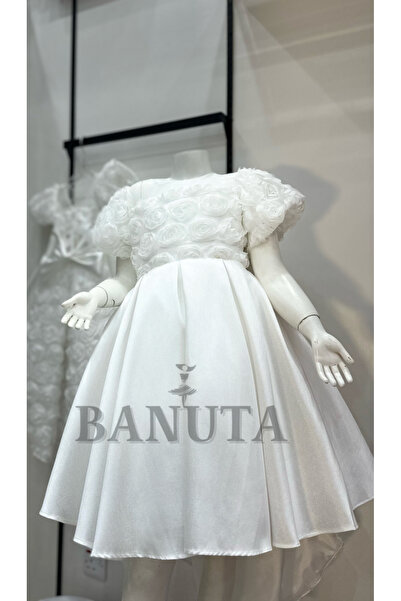 Banuta White rose evening dress with a circular train at the back